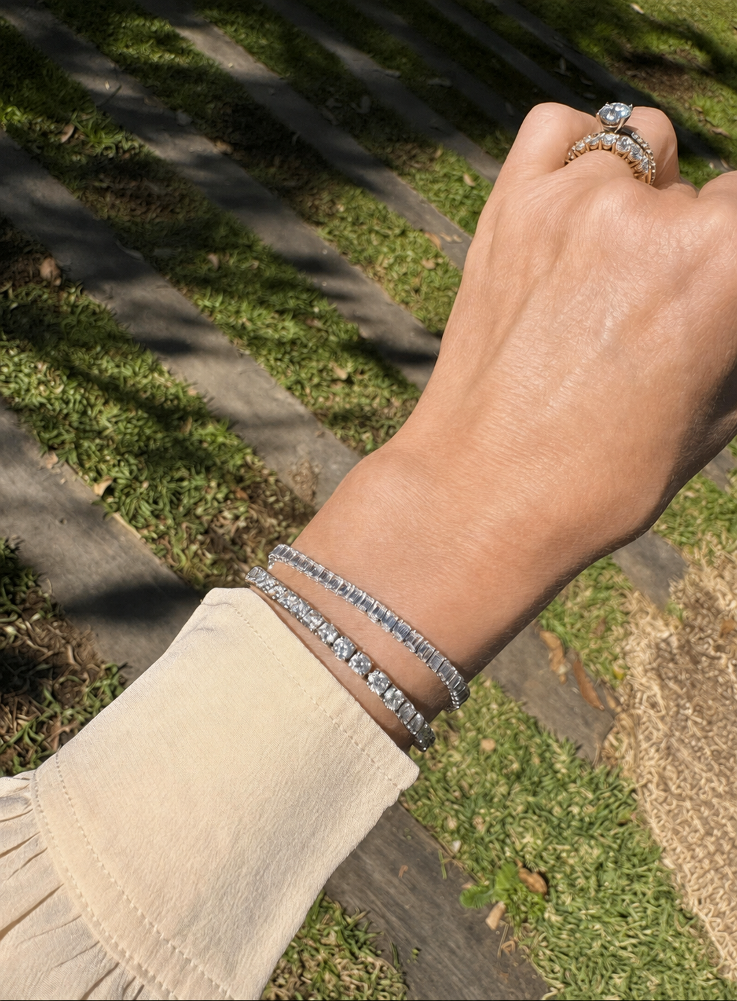 Futurae Diamonds Tennis Lab-Grown Diamond Emerald-Cut Bracelet worn stacked on the wrist, styled for everyday wear.